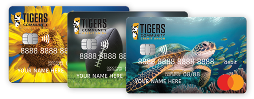 Image of an stock photos printed on a 3 separate Tigers Community debit cards