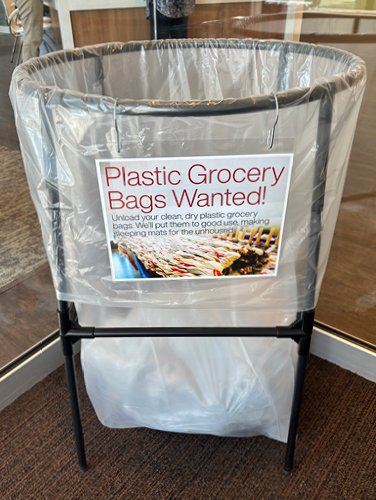 Photo of the bins in branches for people to put their donated plastic bags.